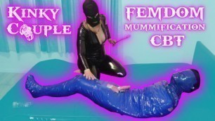 Femdom Goddess Whips Balls of Mummified Slave